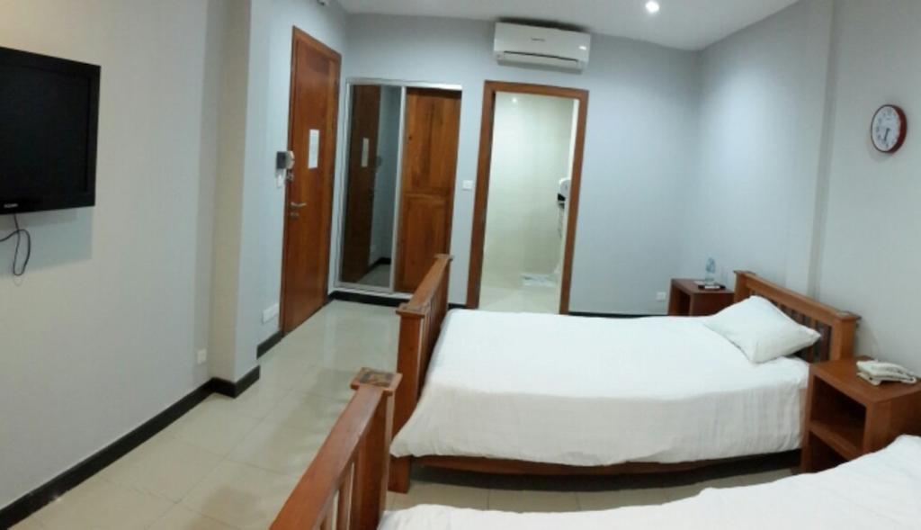Dodo Guesthouse Phnom Penh Chambre photo